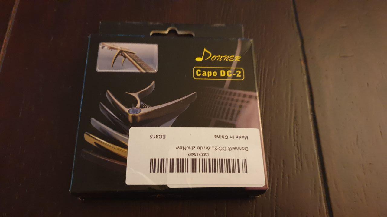 Donner® DC-2 Capo Profesional Disparador, 4 Colores, para Guitarra